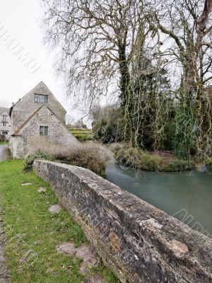 stone wall and willow tree