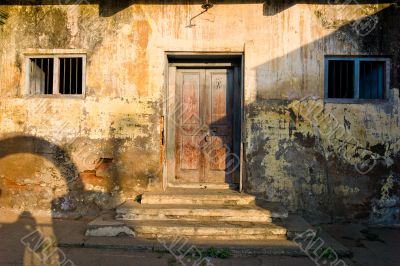 unkempt wall and door