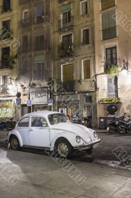 white beetle car in street