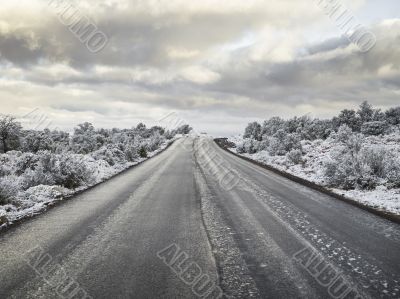 black and white image of the long road