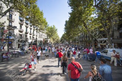 people at streets of barcelona spain