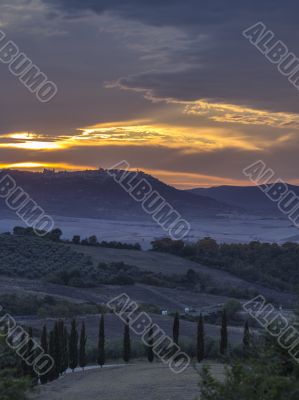 rollingtuscan landscape at dusk