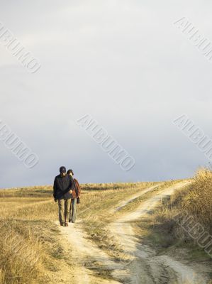 people walking in field