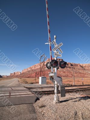 railroad and road sign in red canyon railroad and road sign in red canyon