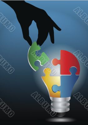 human hand joining light bulb puzzle