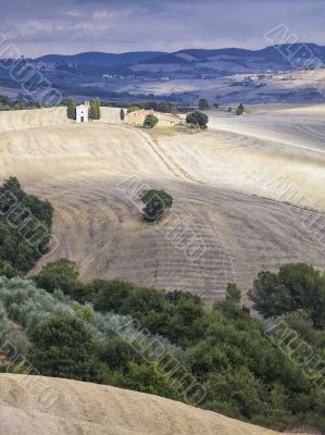 view of mountain range and field