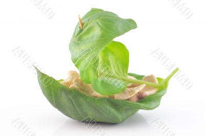 Cashew nuts in a basil leaf