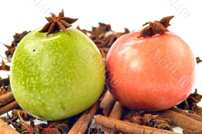 Green and pink apple with spices