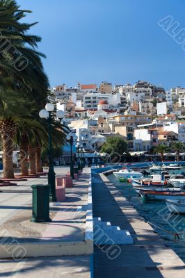 Promenade with palm trees in the town of Sitia