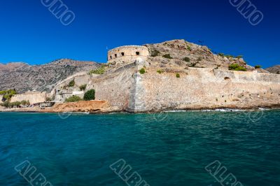 The island-fortress of Spinalonga in Crete The island-fortress of Spinalonga in Crete