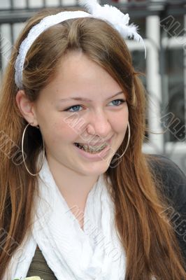 Laughing young Girl with Braces