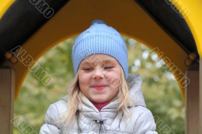 Beautiful girl with blond hair and blue eyes