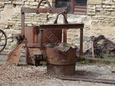 rusty metal pot in an old foundry