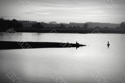 Angler on the breakwater