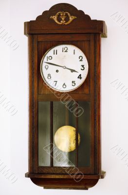 old grandfather's clock with pendulum