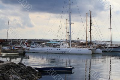 Boat and catamaran on the beach