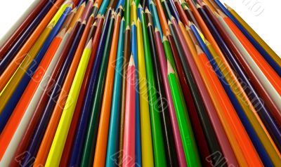 many colored pencils pointing up