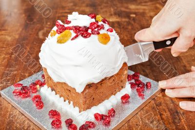 Cutting christmas cake