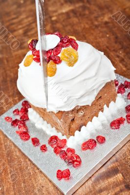 Cutting christmas cake