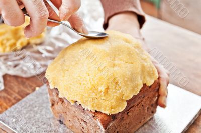 Modeling christmas cake with spoon Modeling christmas cake with spoon
