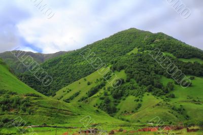 Summer landscape with Caucasus green mountains