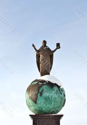 Religious sculpture - man in the mantle on the globe
