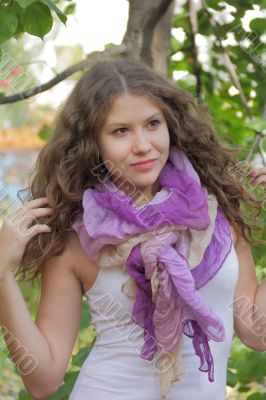 Portrait of woman with violet scarf