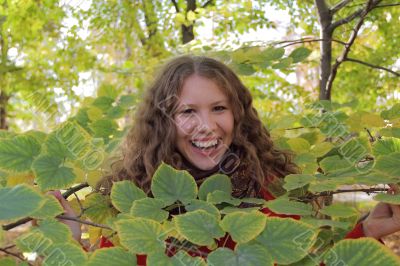 Young woman with autumn leaves Young woman with autumn leaves
