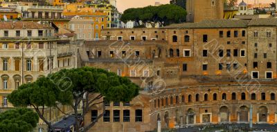 Modern and ancient buildings in Rome at sunset