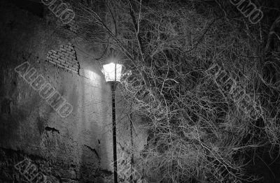 Street lamp near an ancient wall in Rome