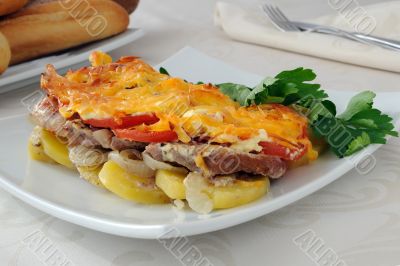 Meat and cheese with potatoes