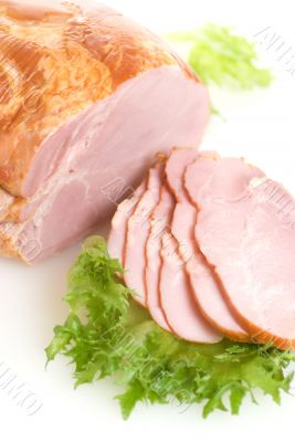 Sliced ham with salad