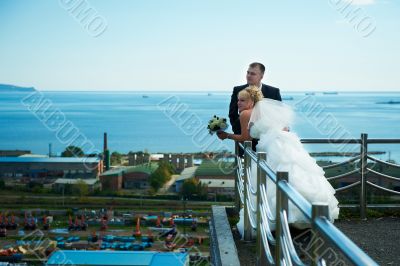 Bride and groom of blue sky