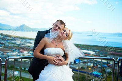 Bride and groom of blue sky