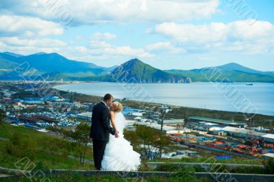 Bride and groom of blue sky