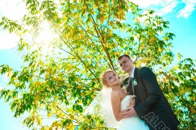 Bride and groom of blue sky