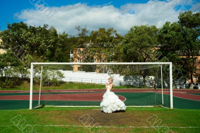 Bride on the football field
