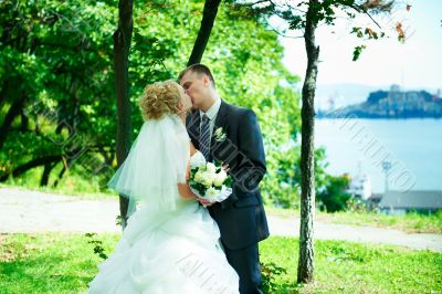 Bride and groom at the park