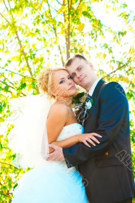 Bride and groom at the park