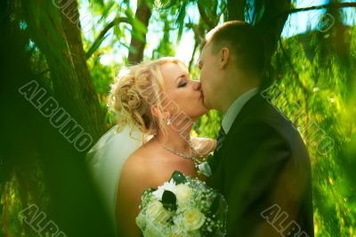 Bride and groom at the park