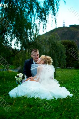 Bride and groom at the park