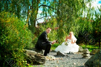 Bride and groom at the park