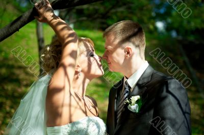 Bride and groom at the park