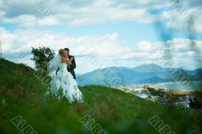 Bride and groom at the park