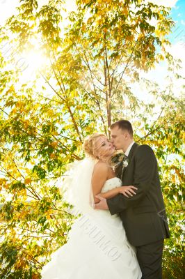 Bride and groom at the park