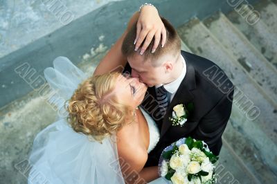 Bride and groom at the stairs