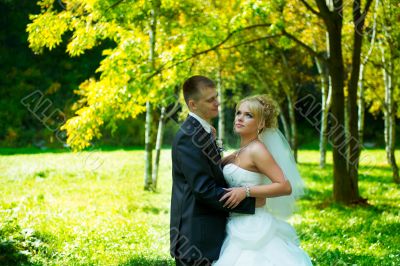 Bride and groom at the park