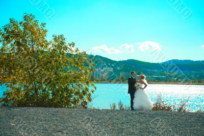 Bride and groom at the park