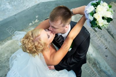 Bride and groom at the stairs