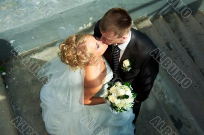 Bride and groom at the stairs